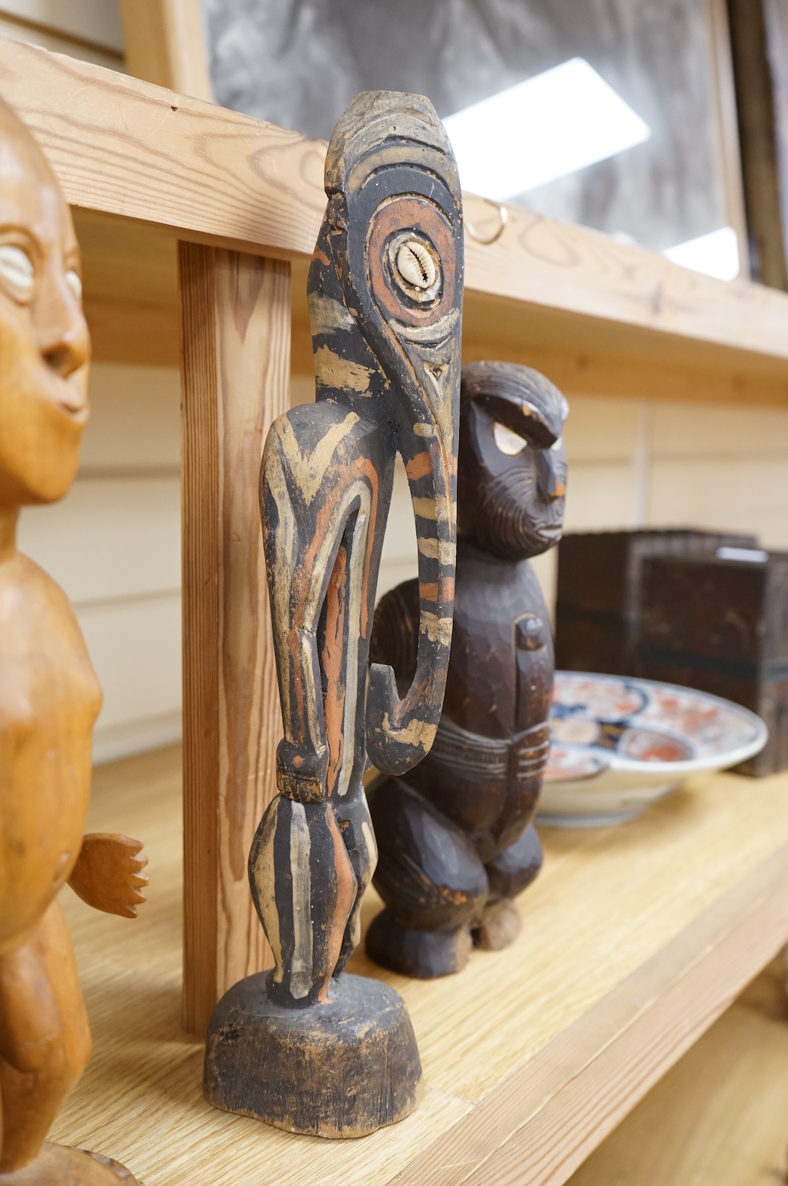Three wood tribal figures, Africa, South Seas, tallest 37.5cm